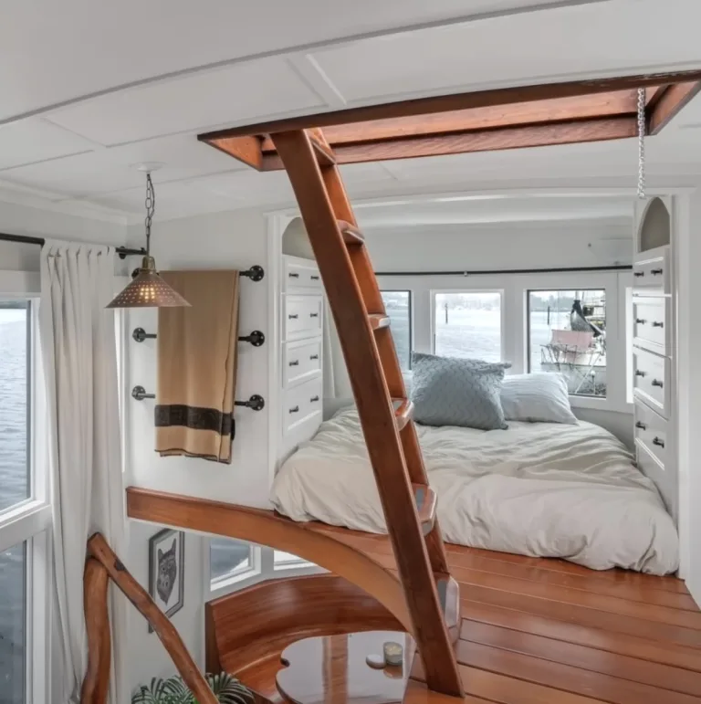 Couple purchase a rickety houseboat for $6,000 & transform it into a luxurious modern home on water