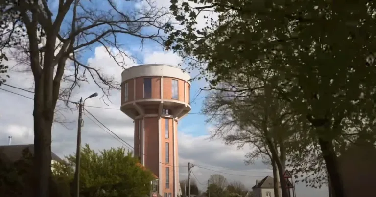 Couple buy old, abandoned water tower & turn it into a stunning home with a one-of-a-kind rooftop